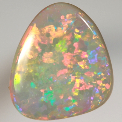 SOLID SEMI BLACK OPAL Quality opal. Very bright, red and orange rolling flashes over green and purple. With VIDEO